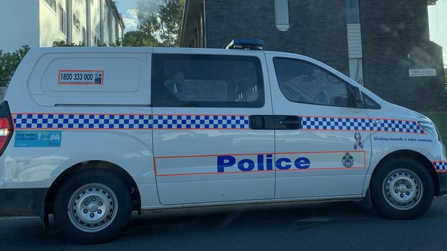 Police outside a Gladstone residence where the body of a person was discovered this afternoon.