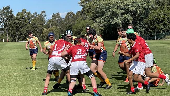 WESTMAC attack the St Paul's line in TAS rugby.