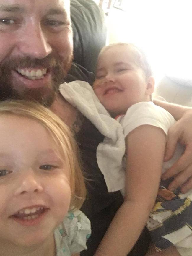 Jake Skarratts with his girls, Paige, 4, and Imogen, 2.