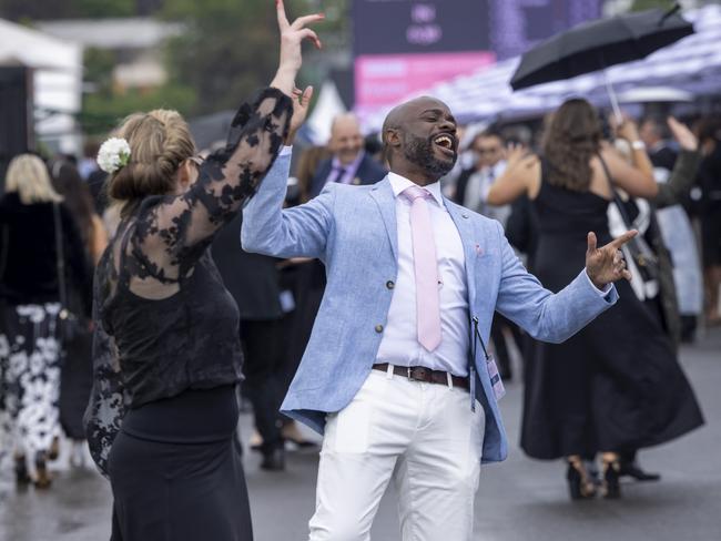 Literally singing in the rain. Picture: Getty Images