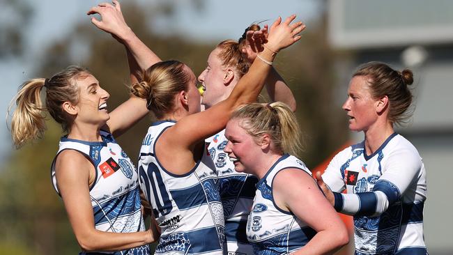 PERTH, AUSTRALIA - OCTOBER 26: Aishling Moloney of the Cats celebrates a goal with teammates during the 2024 AFLW Round 09 match between the Waalitj Marawar (the West Coast Eagles) and the Geelong Cats at Mineral Resources Park on October 26, 2024 in Perth, Australia. (Photo by Will Russell/AFL Photos via Getty Images)