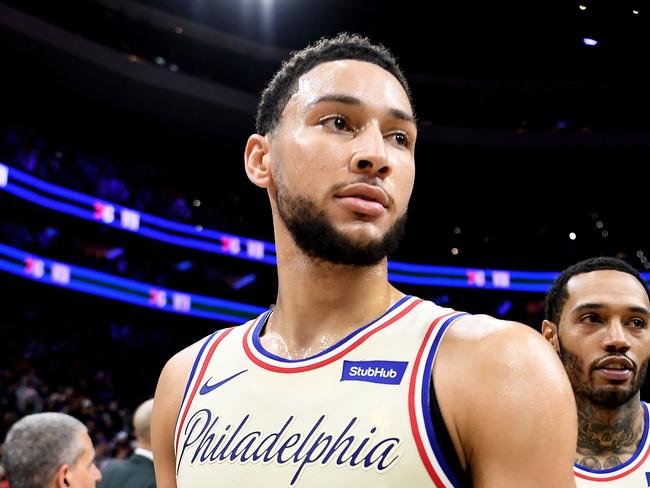 PHILADELPHIA, PENNSYLVANIA - DECEMBER 25: Ben Simmons #25 of the Philadelphia 76ers looks on after the game against the Milwaukee Bucks at Wells Fargo Center on December 25, 2019 in Philadelphia, Pennsylvania. The Philadelphia 76ers won 121-109. NOTE TO USER: User expressly acknowledges and agrees that, by downloading and or using this photograph, User is consenting to the terms and conditions of the Getty Images License Agreement.   Sarah Stier/Getty Images/AFP == FOR NEWSPAPERS, INTERNET, TELCOS & TELEVISION USE ONLY ==