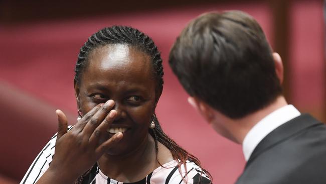 Liberal Senator Lucy Gichuhi reacts during debate in the Senate chamber at Parliament House in Canberra, Monday, September 10, 2018. (AAP Image/Lukas Coch) NO ARCHIVING