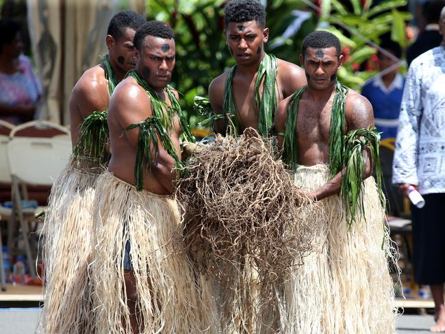 The Duke and Duchess of Sussex Prince Harry and Meghan take part in a traditional fijian ceremony at Nadi Airport in Fiji to . Picture: Nathan Edwards