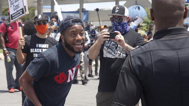 Protestors hold a demonstration near the Wendy's fast food restaurant in Atlanta.