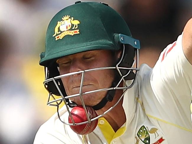 PERTH, AUSTRALIA - DECEMBER 15:  Steve Smith of Australia is struck by a delivery from Craig Overton of England during day two of the Third Test match during the 2017/18 Ashes Series between Australia and England at WACA on December 15, 2017 in Perth, Australia.  (Photo by Ryan Pierse/Getty Images)