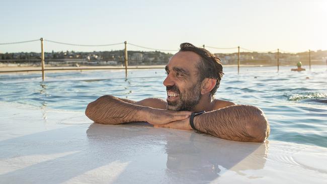 Qantas has unveiled its latest advertisement featuring a host of Aussie icons including Adam Goodes in the Bondi Icebergs’ ocean baths. Picture: Toby Burrows