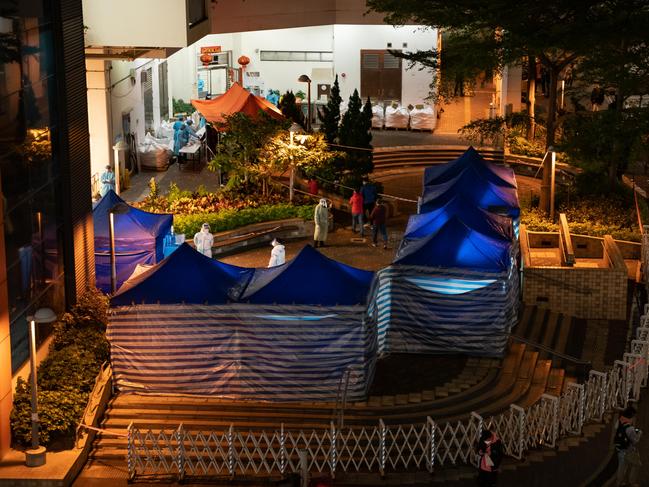 Hong Kong residents get tested for Covid in makeshift stations amid Omicron wave. Picture: Getty Images.