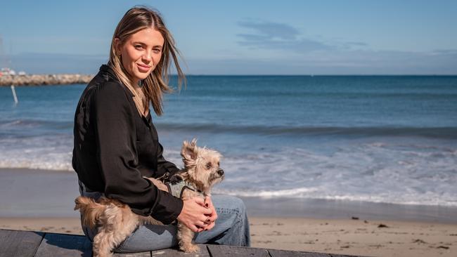 Jessie Powell, with her dog Franklyn in her new home city of Fremantle, has become a passionate advocate for DonateLife. Picture: Tony McDonough