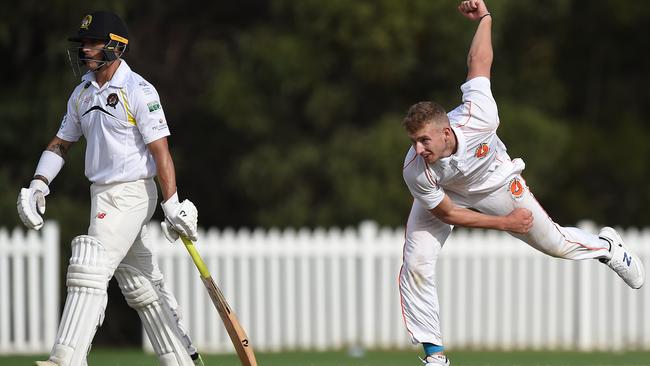 Matt Madeley bowling for Runaway Bay. Picture: Lawrence Pinder