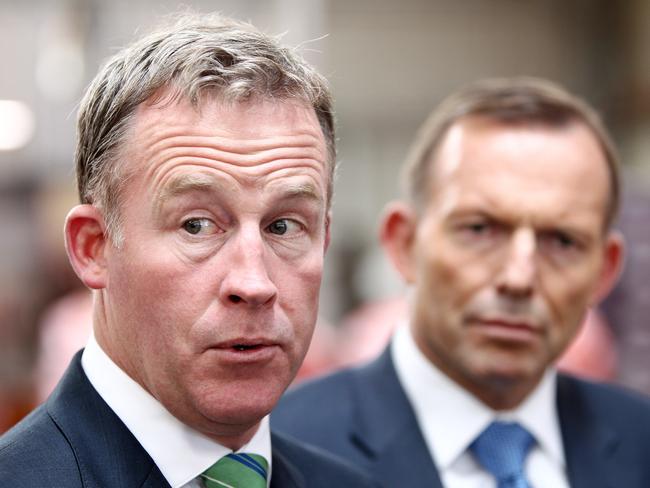 (L-R) Tasmanian Premier Will Hodgman and Prime Minister Tony Abbott during a visit to Charlton Farm Produce at Moriarty