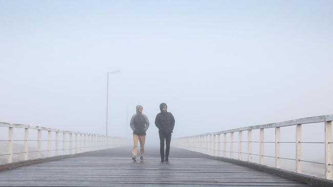 A thick fog shrouded much of Adelaide early Monday and Tuesday morning. Picture: Dean Martin