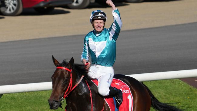 James McDonald celebrates aboard Romantic Warrior. Picture: Scott Barbour/Racing Photos via Getty Images