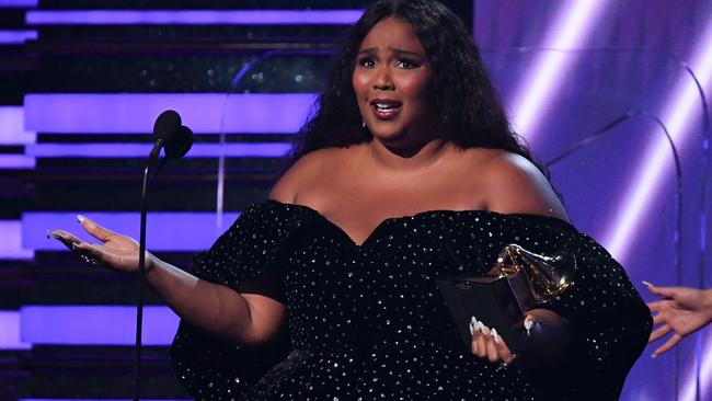 Lizzo accepts the award for Best Pop Solo Performance. Picture: Robyn Beck/AFP