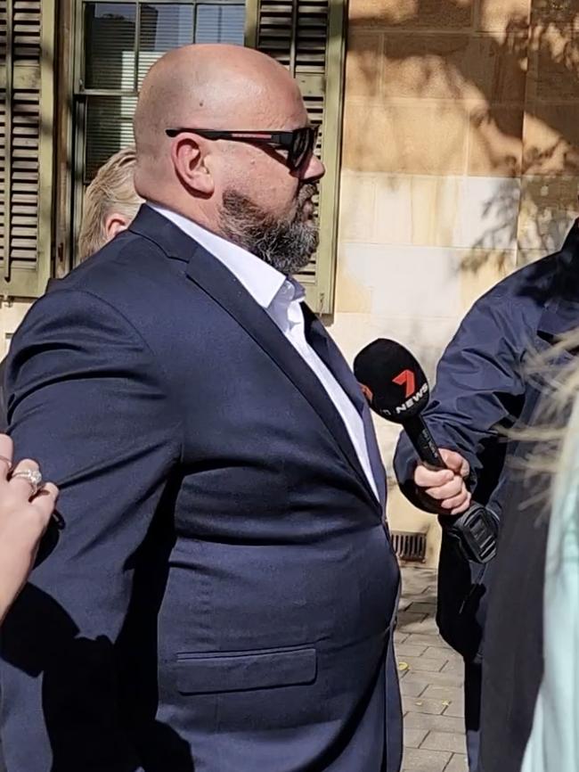 Father Ben Miller leaves court after all charges over an alleged cancer scam relating to his young son were dropped. Picture: Leah Smith