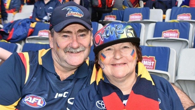 Peter Kauschke, 59, with wife, Tina Kauschke, 60, attending an Adelaide Crows football game.