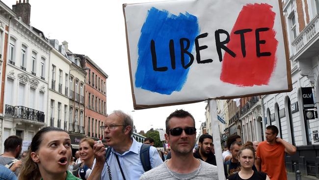 Protesters took to the streets across France on August 21 to rally against the health pass needed to enter a restaurant or travel on an inter-city train. Picture: AFP