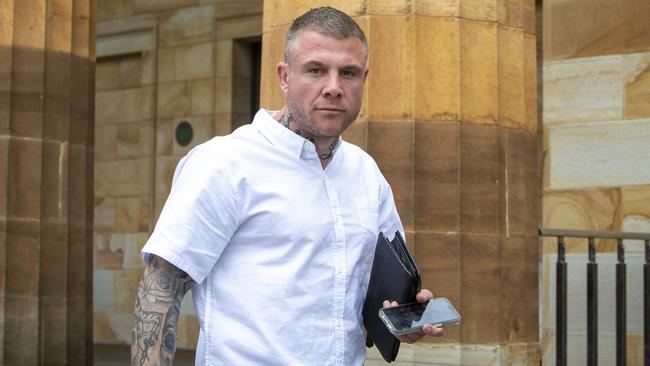 Comanchero bikie Daniel Abrahamson leaves the Adelaide Magistrates Court for an earlier appearance. Picture NCA NewsWire