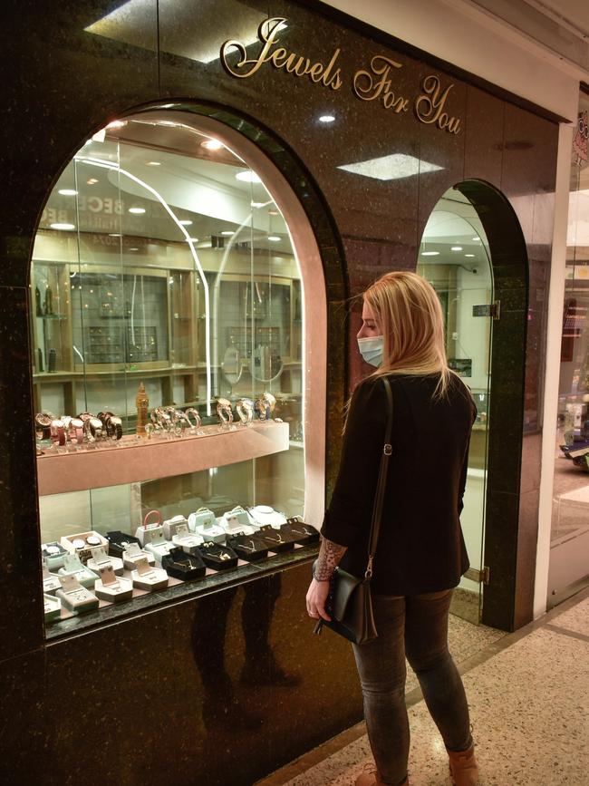 Cassie admire jewellery in various shops along the way. Picture: Backgrid