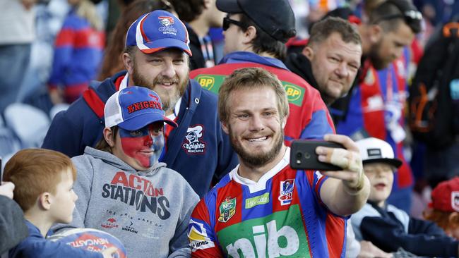 Nathan Ross with fans following Newcastle’s win over the Dragons.