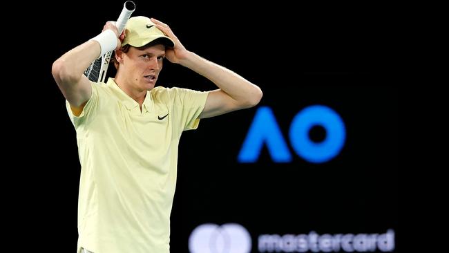 Italy's Jannik Sinner celebrates the match point against Germany's Alexander Zverev during their men's singles final match on day fifteen of the Australian Open tennis tournament in Melbourne on January 26, 2025. (Photo by Martin KEEP / AFP) / -- IMAGE RESTRICTED TO EDITORIAL USE - STRICTLY NO COMMERCIAL USE --