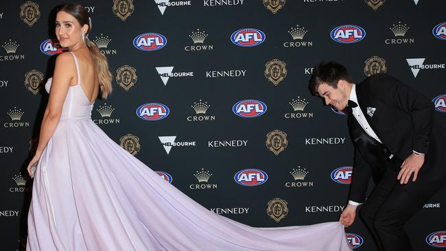 Zach Merrett helps partner Alexandra get the perfect shot. Picture: Mark Stewart.