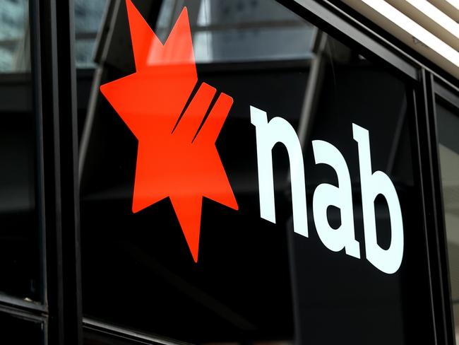 SYDNEY, AUSTRALIA - MARCH 27: The National Australia Bank Ltd. logo at Barangaroo on March 27, 2024 in Sydney, Australia. In the last quarter, Westpac Bank reported a quarterly cash profit of A$1.8 billion, meeting consensus expectations, while NAB experienced a 17% decline in first-quarter cash profit compared to the previous corresponding period, reflecting varying performances among the major Australian banks. (Photo by Brendon Thorne/Getty Images) (Photo by Brendon Thorne/Getty Images)