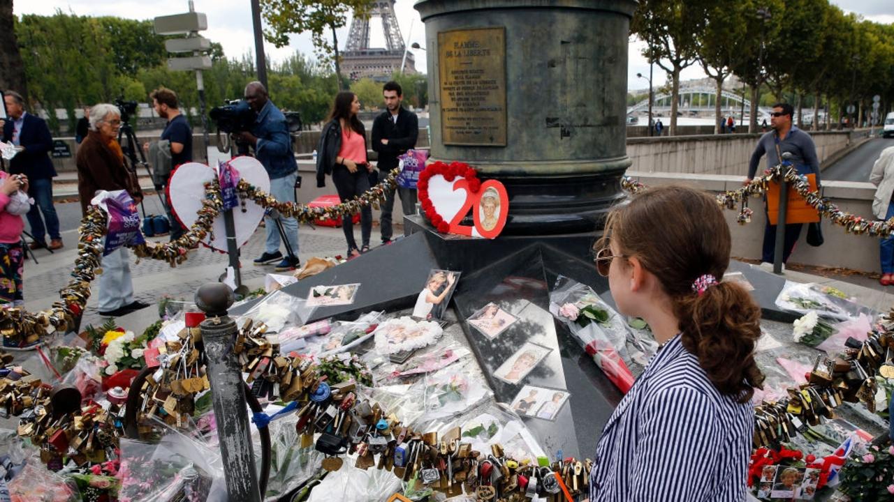 Flowers and cards adorn the plinth of the Flame of Liberty statue in Paris, France on the 20th anniversary of her death five years ago. Picture: Thierry Chesnot/Getty Images.