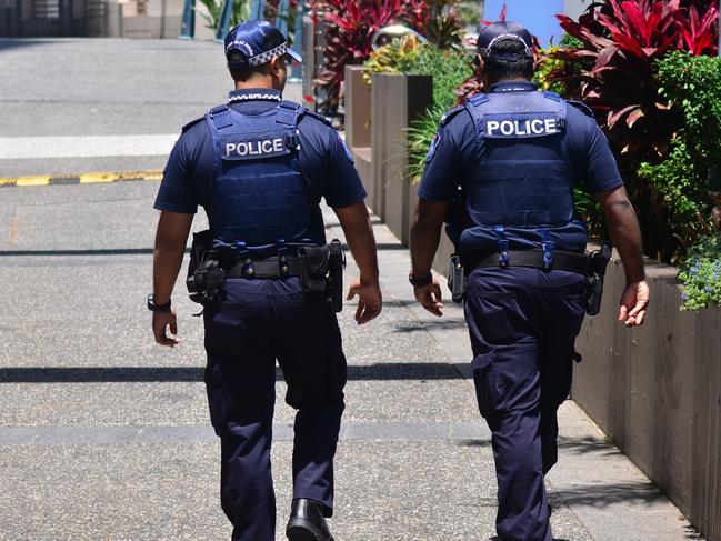 Gold Coast, Australia - October 28, 2014: Police officers patrol the streets in Surfers Paradise. Gold Coast police on high terror alert warned to be hyper vigilant and patrol local mosques and critical infrastructure sites