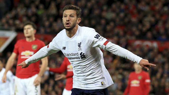 Liverpool’s Adam Lallana celebrates after scoring against Manchester United at Old Trafford. Picture: AP