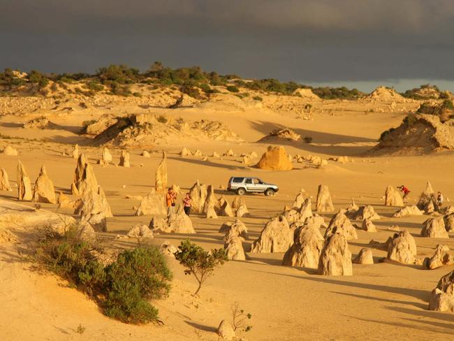 Cruise through the ancient limestone formations of The Pinnacles Desert in Western Australia. Photo: Gemma Phillips