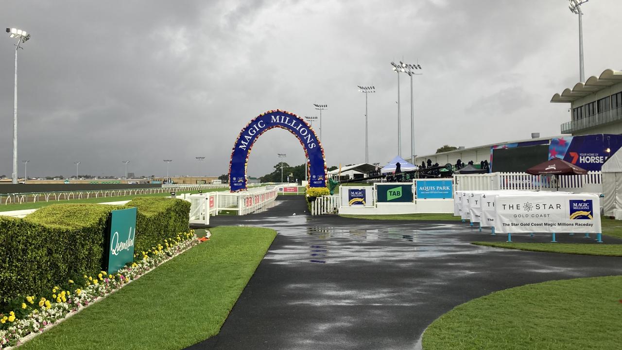 The soaked track after the Magic Millions race meeting was called off midway through the event. Picture: Greg Stolz