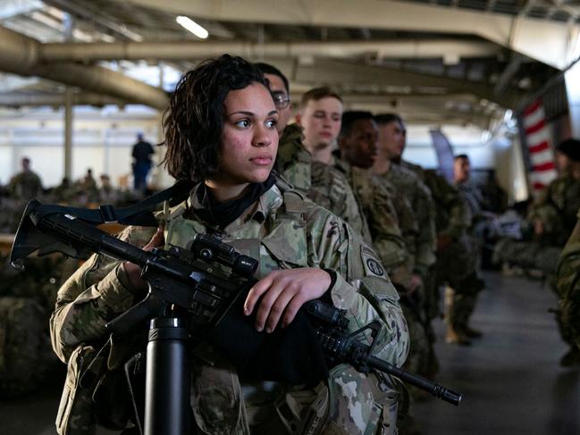 US soldiers wait to be deployed to Europe, February 14, 2021, in Fort Bragg, North Carolina. - US service members based in Fort Bragg, North Carolina, are preparing deploy to Europe as the crisis between Russia and Ukraine escalates. (Photo by Allison Joyce / AFP)