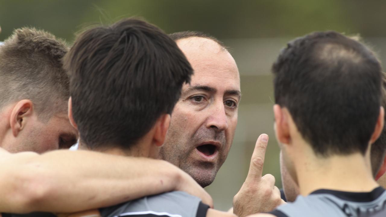 Amateur footy: Brighton v Adelaide University at Brighton Oval. University Coach Craig Smith makes a point at three quarter time. 13 April 2019. (AAP Image/Dean Martin)