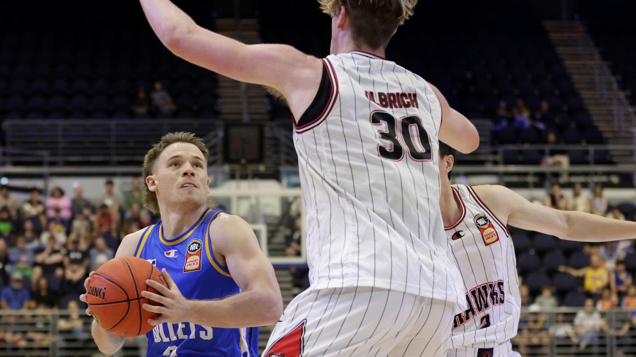 Isaac White tries to find a way past the Illawarra Hawks defence. Picture: Russell Freeman/Getty Images for NBL