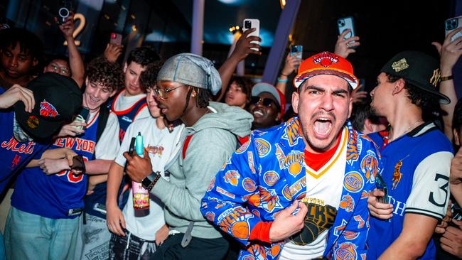 The victory sparked wild celebrations across the city. (Photo by Angelina Katsanis/Getty Images via AFP)