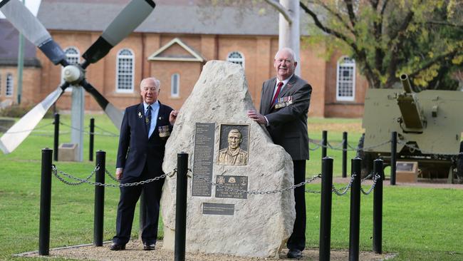 Ken Foster (right, pictured with fellow Vietnam Veteran Elwyn Spencer, will witness the repatriation mission at RAAF Richmond on Thursday and said it would be a highly emotional event.