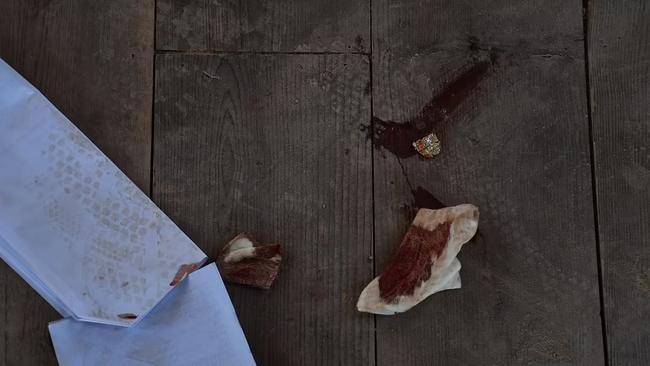 Image shows blood on a film script and bandage after the fatal shooting. Picture: Supplied