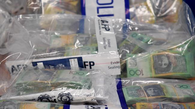 Police allege they seized drugs, cash and firearms.