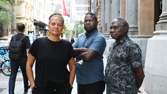 Tiwi islander elders Antonia Burke, Simon Munkara and Pirrawayingi Puruntatameri protest out side the NAB AGM over the bank’s funding of Santos gas projects in the NT. Picture: John Feder