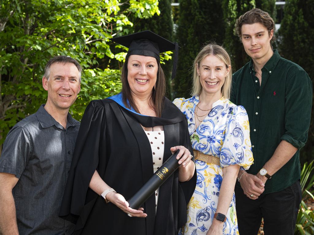 Bachelor of Science with Distinction graduate Bec Byrne celebrates with (from left) Rob Byrne, Sarah Soich and Connor Miers at a UniSQ graduation ceremony at The Empire, Wednesday, October 30, 2024. Picture: Kevin Farmer