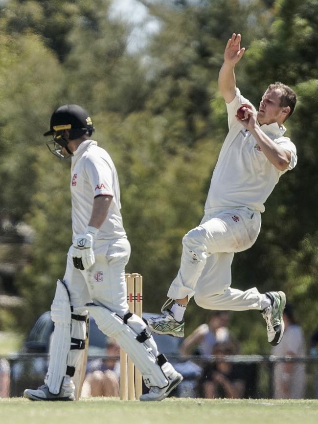 Jackson Fry bends his back in search of a wicket. Picture: Valeriu Campan