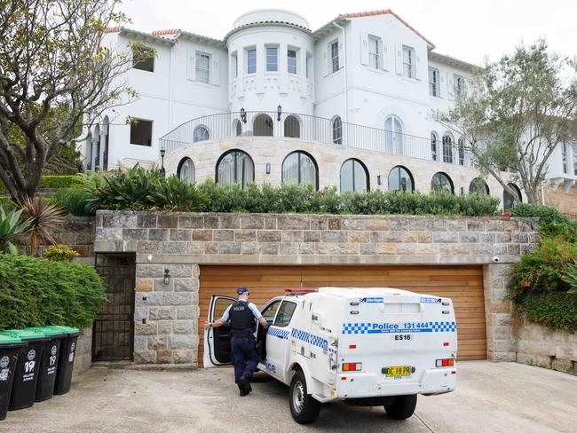 Police outside the Vaucluse home of Optus CEO Kelly Bayer Rosmarin on Thursday. Picture by Max Mason-Hubers