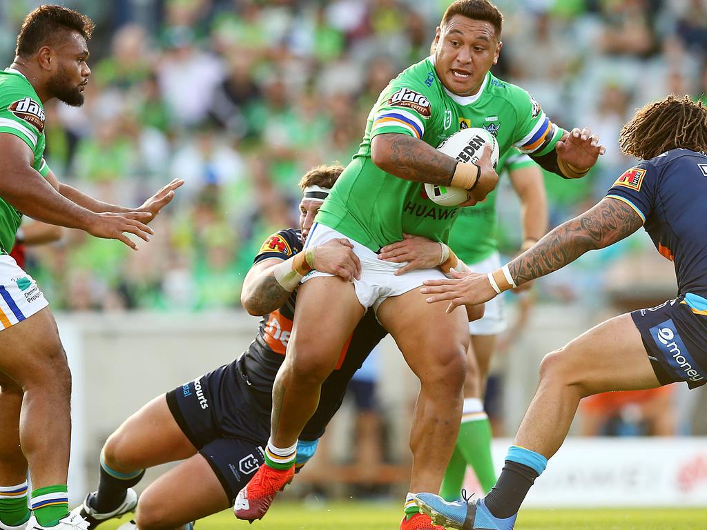 Josh Papalii of the Raiders runs the ball during the round 1 NRL match between the Canberra Raiders and the Gold Coast Titans.