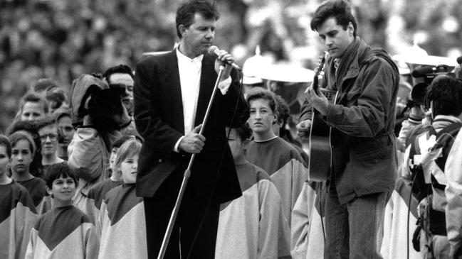 Daryl Braithwaite performing at the 1991 grand final at Waverley Park.