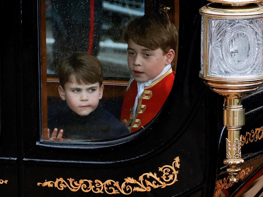 Prince Louis and his brother Prince George depart following the coronation ceremony. Picture: PIROSCHKA VAN DE WOUW / POOL / AFP