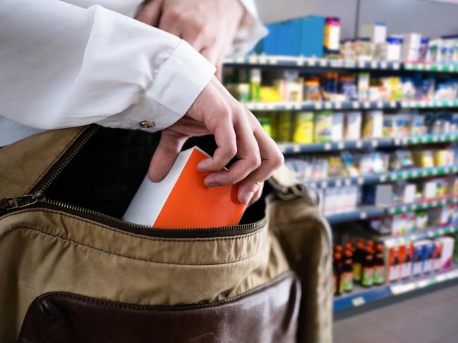 Retail Shoplifting. Woman Stealing In Supermarket. Theft At Shop