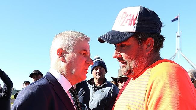 Deputy PM Michael McCormack being contronted by a farmer at Parliament House in Canberra. Picture: Kym Smith