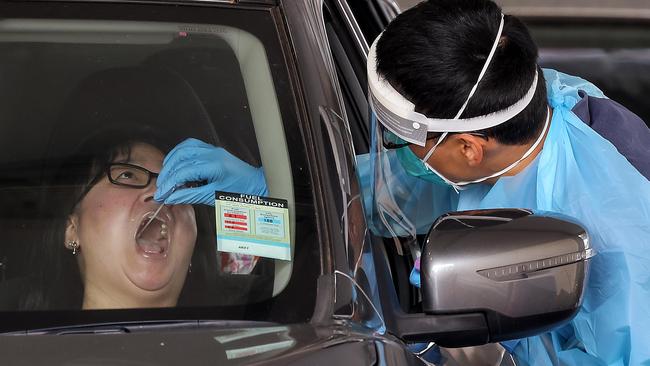 A woman is tested for coronavirus in Broadmeadows on November 17. Picture: NCA NewsWire / Ian Currie