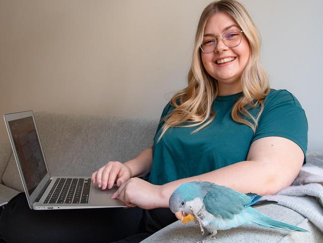 Dana Thomson, pictured with pet bird Atticus, was unsure of her career direction when she first entered the workforce. Picture: Jason Edwards